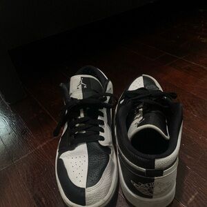 Nike jordan 1 lows, black and white split color. Size 11.5 women size 10 men.
